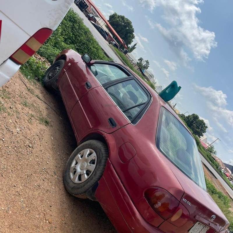 Toyota Corolla 2001 Maroon for Sale In Abuja image