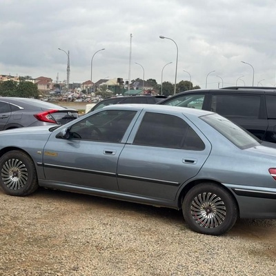SUPER CLEAN AUTOMATIC PEUGEOT 406 FOR SALE IN ABUJA