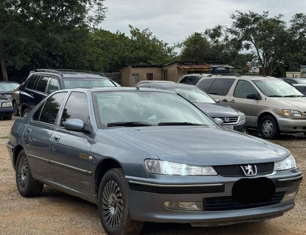 SUPER CLEAN AUTOMATIC PEUGEOT 406 FOR SALE IN ABUJA