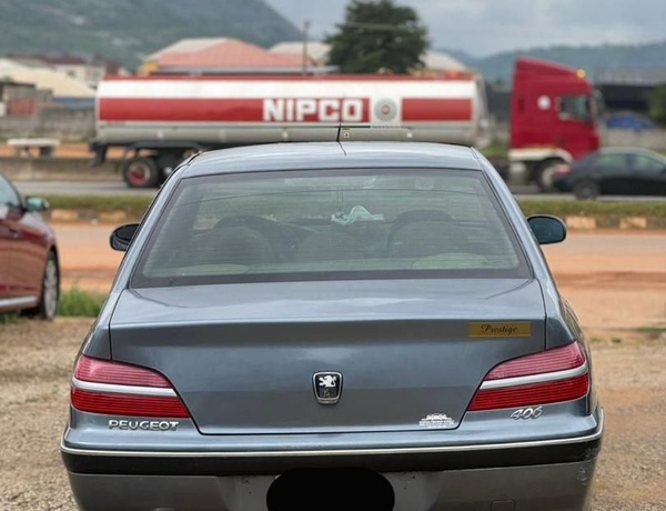 SUPER CLEAN AUTOMATIC PEUGEOT 406 FOR SALE IN ABUJA